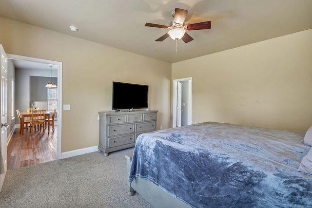 3606 Fairway Fields Ln, Spring Hill, TN 37174 - carpeted bedroom featuring a chandelier, baseboards, and a ceiling fan
