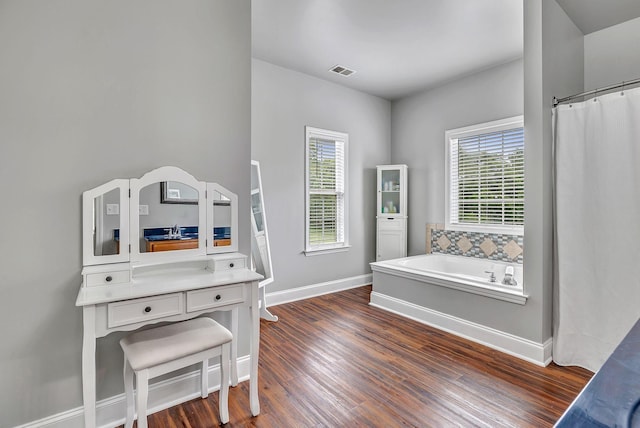 3606 Fairway Fields Ln, Spring Hill, TN 37174 - full bathroom featuring wood finished floors, baseboards, a bath, and curtained shower