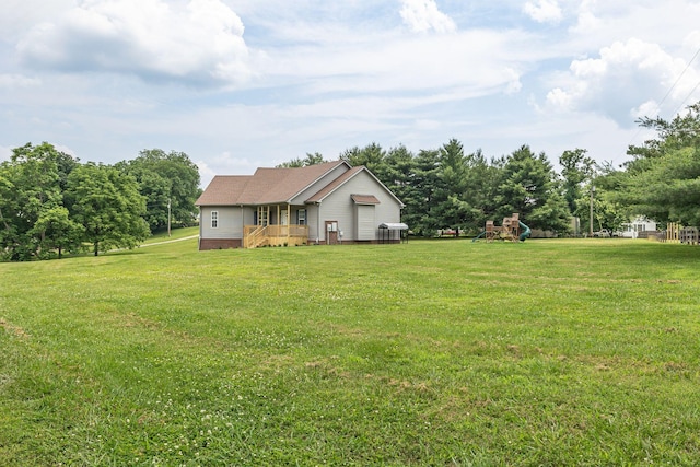 3606 Fairway Fields Ln, Spring Hill, TN 37174 - view of grassy yard featuring a playground and view of scattered trees