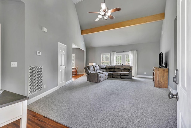 3606 Fairway Fields Ln, Spring Hill, TN 37174 - living room with ceiling fan, dark colored carpet, baseboards, and high vaulted ceiling
