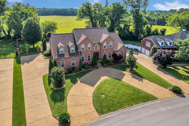 2005 Dunedin Cv, Old Hickory, TN 37138 - view of front facade featuring concrete driveway, brick siding, and a front yard