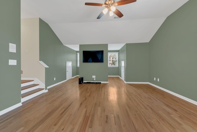 2005 Dunedin Cv, Old Hickory, TN 37138 - unfurnished living room with lofted ceiling, light wood finished floors, a ceiling fan, stairway, and baseboards