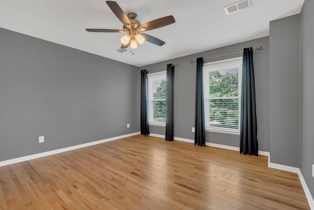 2005 Dunedin Cv, Old Hickory, TN 37138 - empty room featuring baseboards, ceiling fan, and light wood-type flooring