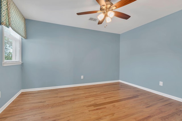2005 Dunedin Cv, Old Hickory, TN 37138 - unfurnished room with baseboards, wood finished floors, and a ceiling fan