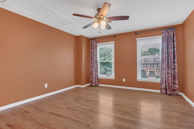 2005 Dunedin Cv, Old Hickory, TN 37138 - empty room featuring attic access, ceiling fan, light wood-style floors, and baseboards