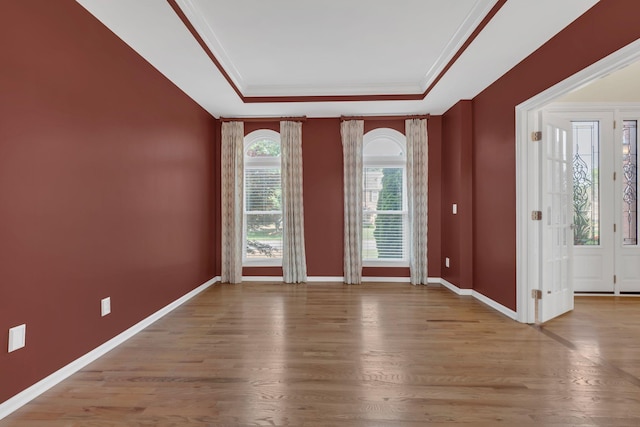 2005 Dunedin Cv, Old Hickory, TN 37138 - entryway featuring a raised ceiling, wood finished floors, baseboards, and crown molding