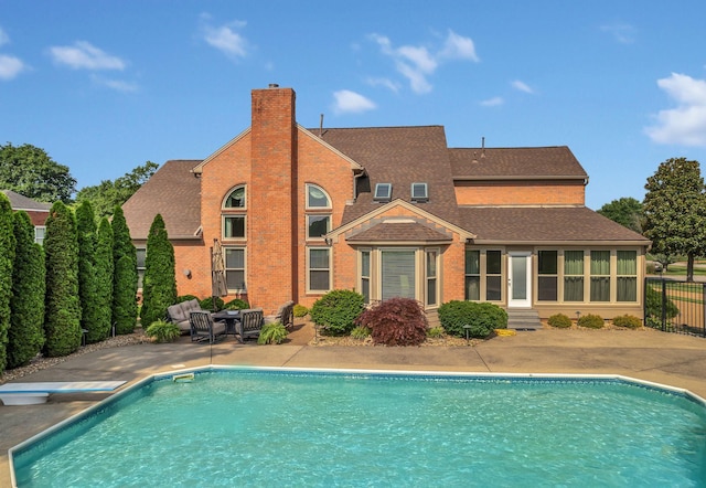 2005 Dunedin Cv, Old Hickory, TN 37138 - outdoor pool featuring a patio area, a diving board, entry steps, and an outdoor living space