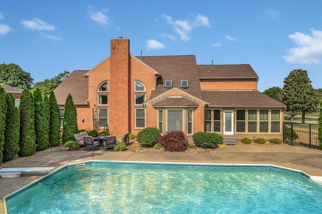 2005 Dunedin Cv, Old Hickory, TN 37138 - view of swimming pool featuring a patio, a diving board, entry steps, and an outdoor hangout area