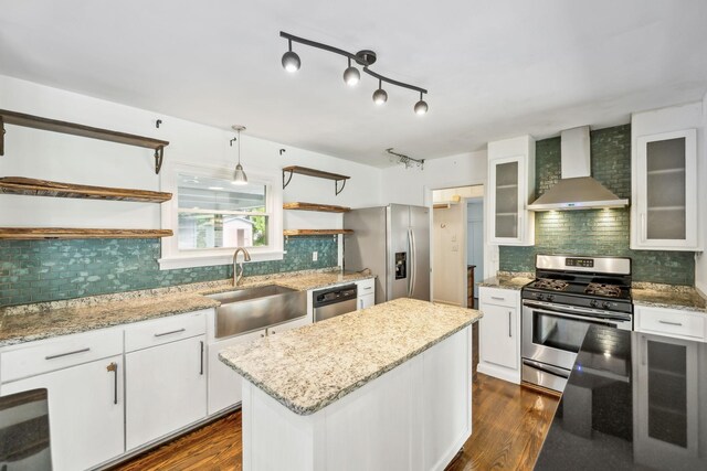 1306 Maymont Dr, Murfreesboro, TN 37130 - kitchen with wall chimney range hood, stainless steel appliances, a sink, open shelves, and tasteful backsplash