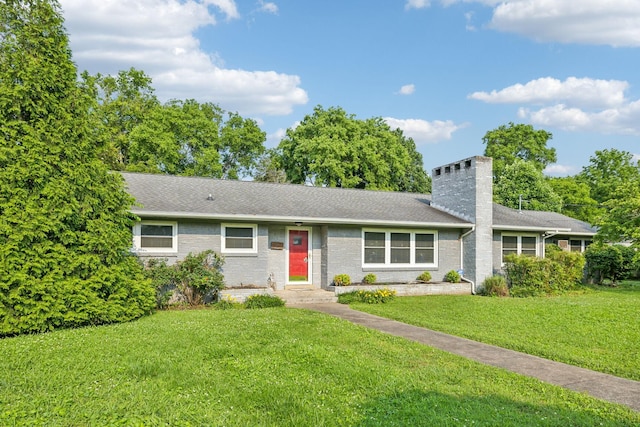 1306 Maymont Dr, Murfreesboro, TN 37130 - view of front facade featuring a front yard, a chimney, a shingled roof, and brick siding
