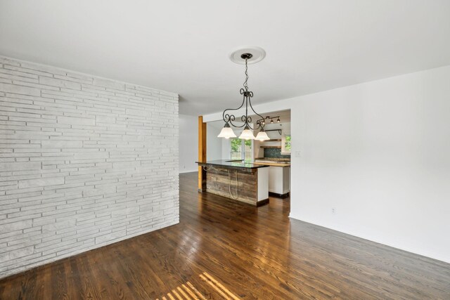 1306 Maymont Dr, Murfreesboro, TN 37130 - unfurnished dining area featuring dark wood-type flooring and a chandelier