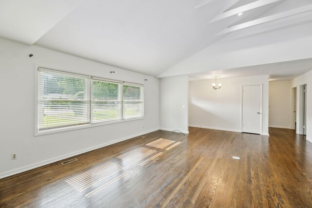 1306 Maymont Dr, Murfreesboro, TN 37130 - unfurnished room featuring a chandelier, lofted ceiling, wood finished floors, and baseboards
