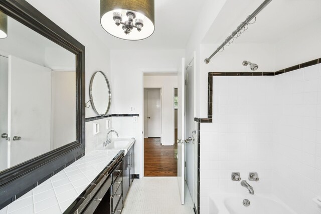 1306 Maymont Dr, Murfreesboro, TN 37130 - bathroom with shower / bathtub combination, double vanity, and tile patterned floors