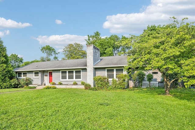 1306 Maymont Dr, Murfreesboro, TN 37130 - view of front of house featuring a chimney and a front lawn