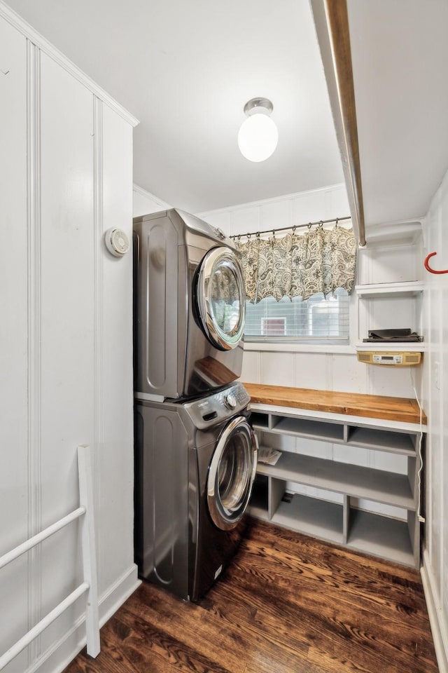 1306 Maymont Dr, Murfreesboro, TN 37130 - laundry room with stacked washer and clothes dryer and dark wood-type flooring