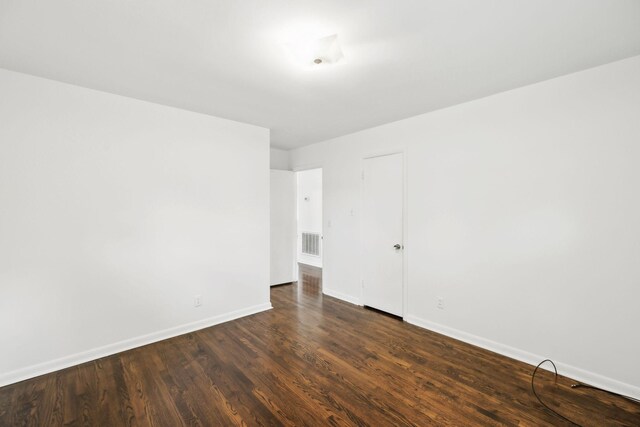 1306 Maymont Dr, Murfreesboro, TN 37130 - spare room featuring baseboards and dark wood-type flooring