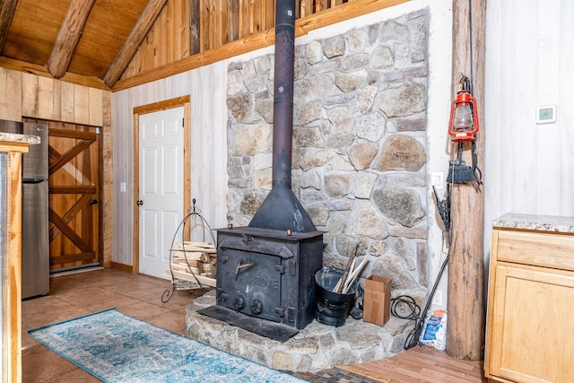 6720 Parker Rd, Lyles, TN 37098 - detailed view of a wood stove and wood ceiling