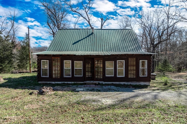 6720 Parker Rd, Lyles, TN 37098 - view of side of home featuring a porch, metal roof, and a yard