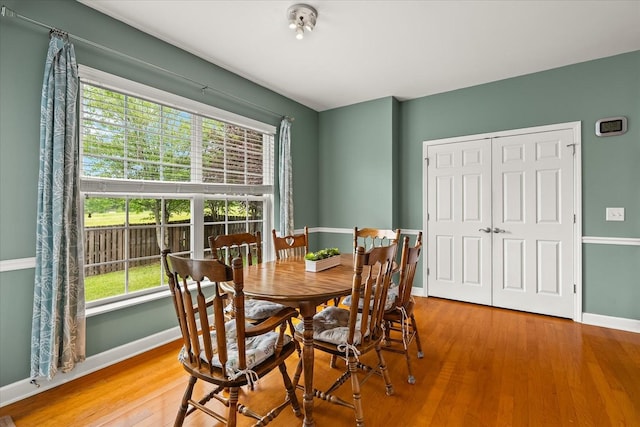 4055 Williford Way, Spring Hill, TN 37174 - dining space with healthy amount of natural light, baseboards, and wood finished floors