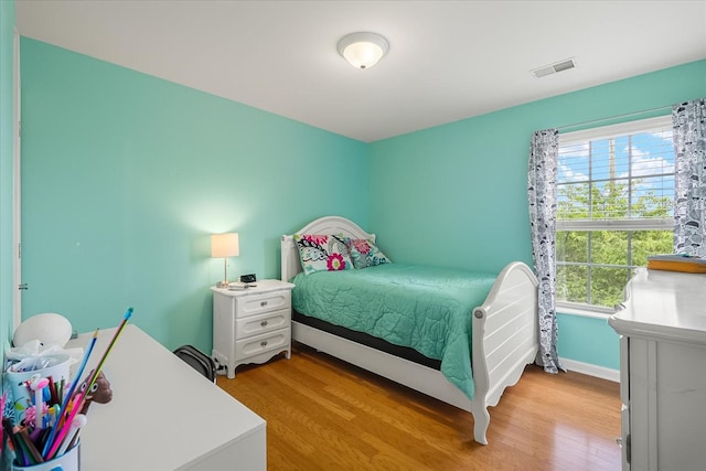 4055 Williford Way, Spring Hill, TN 37174 - bedroom with light wood-type flooring and baseboards