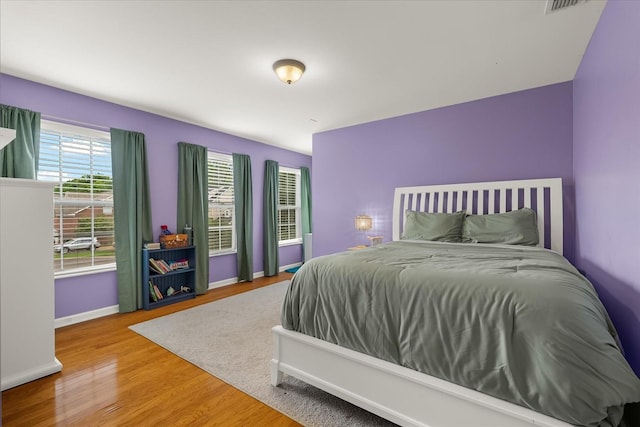 4055 Williford Way, Spring Hill, TN 37174 - bedroom with wood finished floors and baseboards