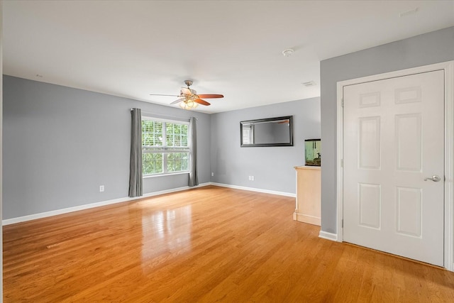 4055 Williford Way, Spring Hill, TN 37174 - empty room with a ceiling fan, light wood-style floors, and baseboards