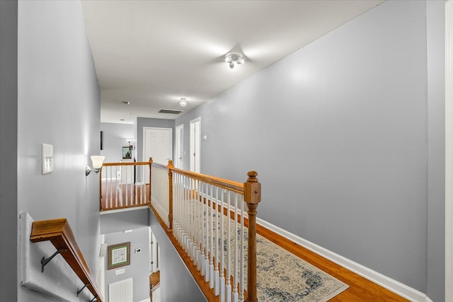 4055 Williford Way, Spring Hill, TN 37174 - corridor with an upstairs landing, wood finished floors, and baseboards