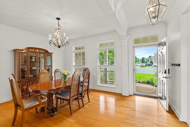 4055 Williford Way, Spring Hill, TN 37174 - dining room featuring a chandelier, ornamental molding, light wood-style flooring, and baseboards