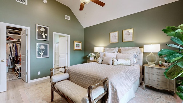 3632 Stormy Ln, Rockvale, TN 37153 - bedroom with a walk in closet, high vaulted ceiling, wood finished floors, a closet, and ceiling fan