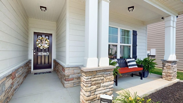 3632 Stormy Ln, Rockvale, TN 37153 - view of exterior entry with a porch and stone siding