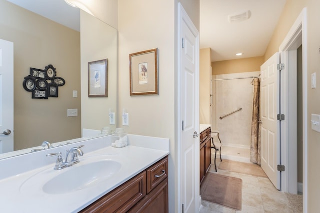 1414 Bernard Way, Franklin, TN 37067 - bathroom featuring vanity, walk in shower, tile patterned flooring, and recessed lighting