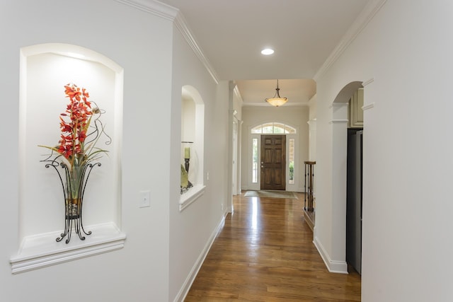 1414 Bernard Way, Franklin, TN 37067 - hall with wood finished floors, recessed lighting, crown molding, baseboards, and arched walkways