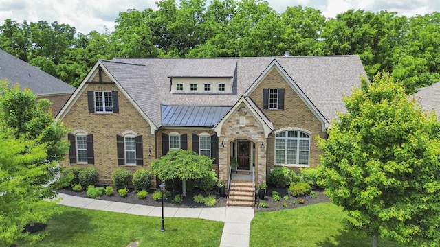 1414 Bernard Way, Franklin, TN 37067 - view of front facade featuring a front yard, a standing seam roof, roof with shingles, brick siding, and metal roof