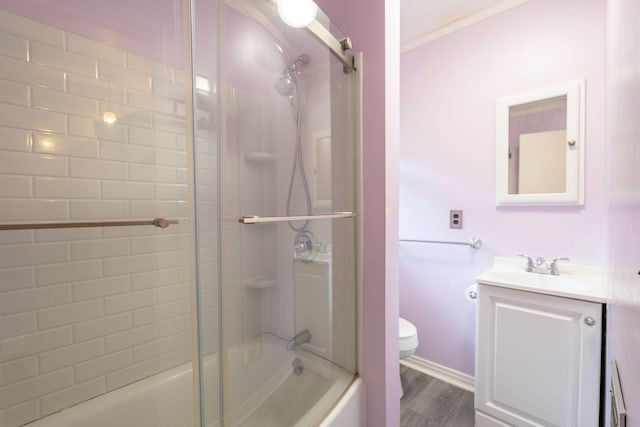 711 Hurricane Hill Dr, Waynesboro, TN 38485 - bathroom featuring toilet, vanity, bath / shower combo with glass door, and wood finished floors
