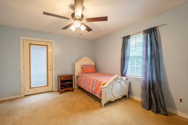 711 Hurricane Hill Dr, Waynesboro, TN 38485 - bedroom featuring light carpet, baseboards, and ceiling fan