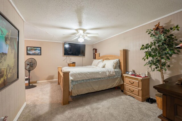 711 Hurricane Hill Dr, Waynesboro, TN 38485 - bedroom with crown molding, light colored carpet, a textured ceiling, a ceiling fan, and baseboards
