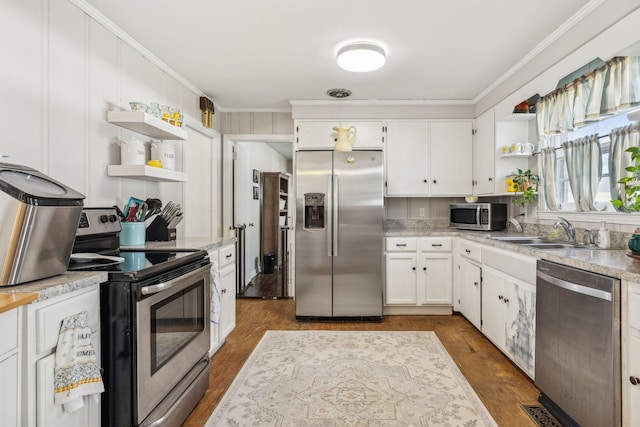 214 Glenn Ave, Gallatin, TN 37066 - kitchen with appliances with stainless steel finishes, open shelves, a sink, light countertops, and white cabinetry