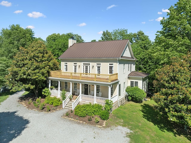 6795 Leipers Creek Rd, Columbia, TN 38401 - view of front facade featuring a porch, a chimney, metal roof, driveway, and a front yard