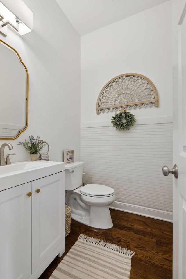 6795 Leipers Creek Rd, Columbia, TN 38401 - half bath with toilet, vanity, and wood finished floors