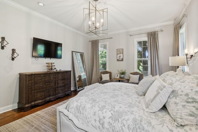 6795 Leipers Creek Rd, Columbia, TN 38401 - bedroom featuring wood finished floors, a chandelier, ornamental molding, and baseboards