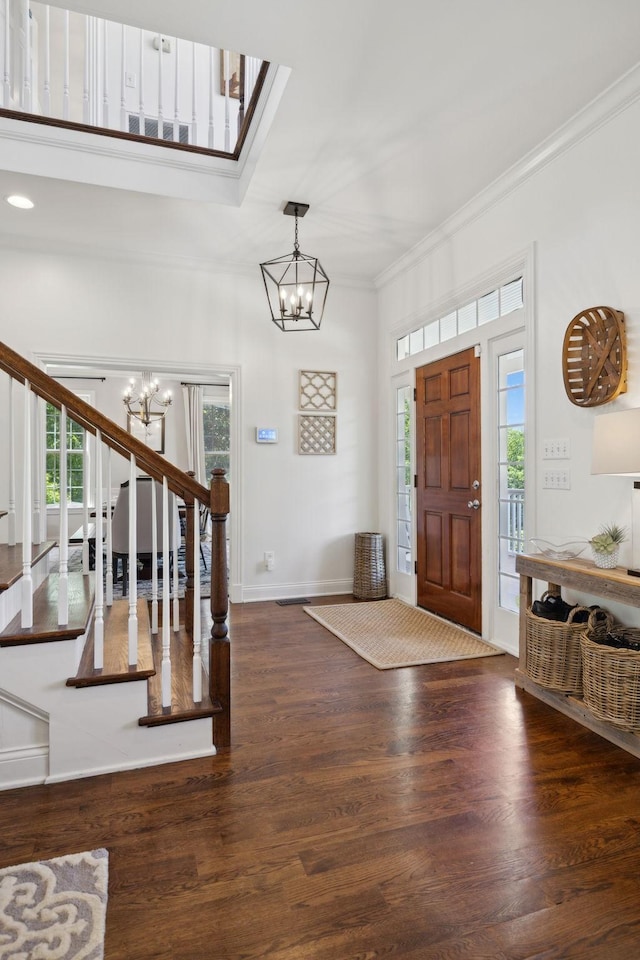 6795 Leipers Creek Rd, Columbia, TN 38401 - entryway with a chandelier, stairway, crown molding, healthy amount of natural light, and wood finished floors