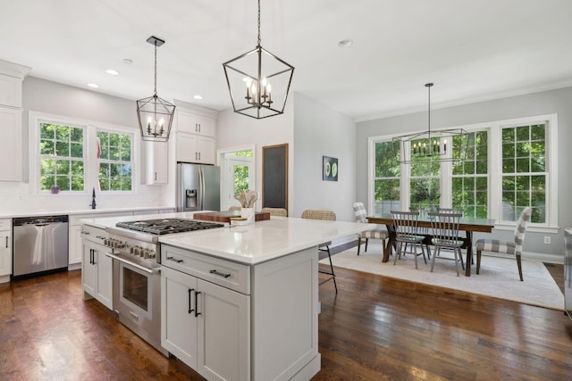 6795 Leipers Creek Rd, Columbia, TN 38401 - kitchen featuring appliances with stainless steel finishes, a chandelier, a kitchen breakfast bar, plenty of natural light, and recessed lighting