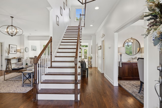 6795 Leipers Creek Rd, Columbia, TN 38401 - foyer with stairway, wood finished floors, a chandelier, crown molding, and baseboards