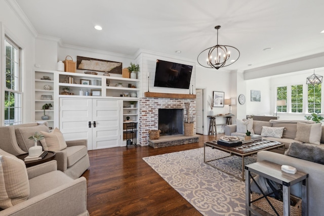 6795 Leipers Creek Rd, Columbia, TN 38401 - living room with ornamental molding, wood finished floors, a chandelier, a fireplace, and recessed lighting