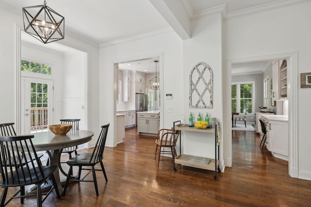 6795 Leipers Creek Rd, Columbia, TN 38401 - dining room featuring a chandelier, dark wood finished floors, and crown molding