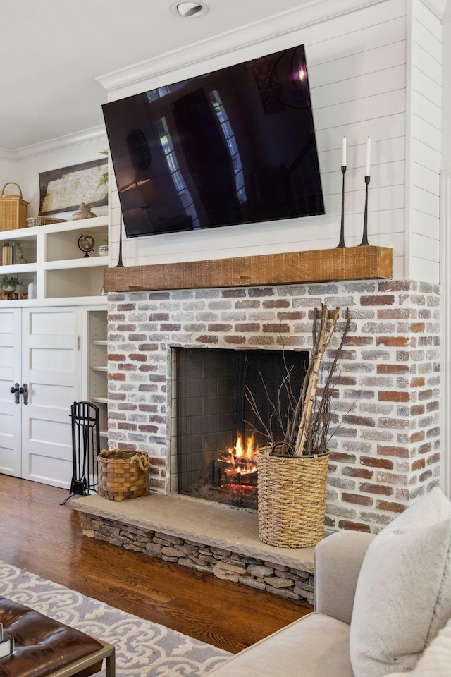 6795 Leipers Creek Rd, Columbia, TN 38401 - detailed view of crown molding, wood finished floors, and a fireplace
