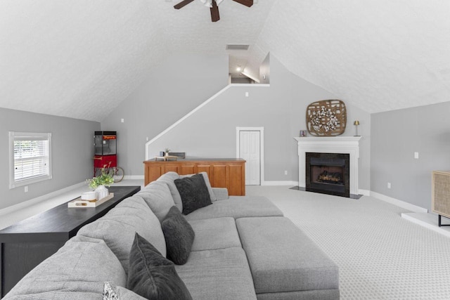 842 Shun Pike, Cottontown, TN 37048 - living area with ceiling fan, vaulted ceiling, carpet floors, baseboards, and a fireplace with flush hearth