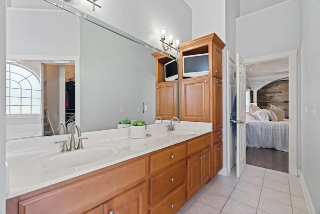 842 Shun Pike, Cottontown, TN 37048 - ensuite bathroom with double vanity, tile patterned flooring, and a spacious closet