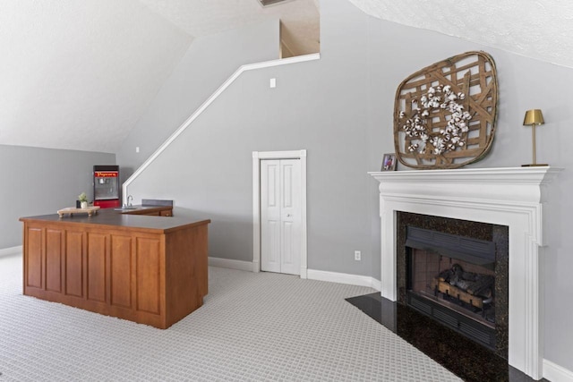 842 Shun Pike, Cottontown, TN 37048 - office with vaulted ceiling, light carpet, a fireplace with flush hearth, and baseboards