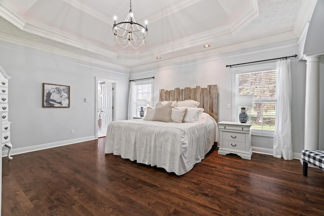842 Shun Pike, Cottontown, TN 37048 - bedroom with a chandelier, multiple windows, a tray ceiling, dark wood-type flooring, and crown molding